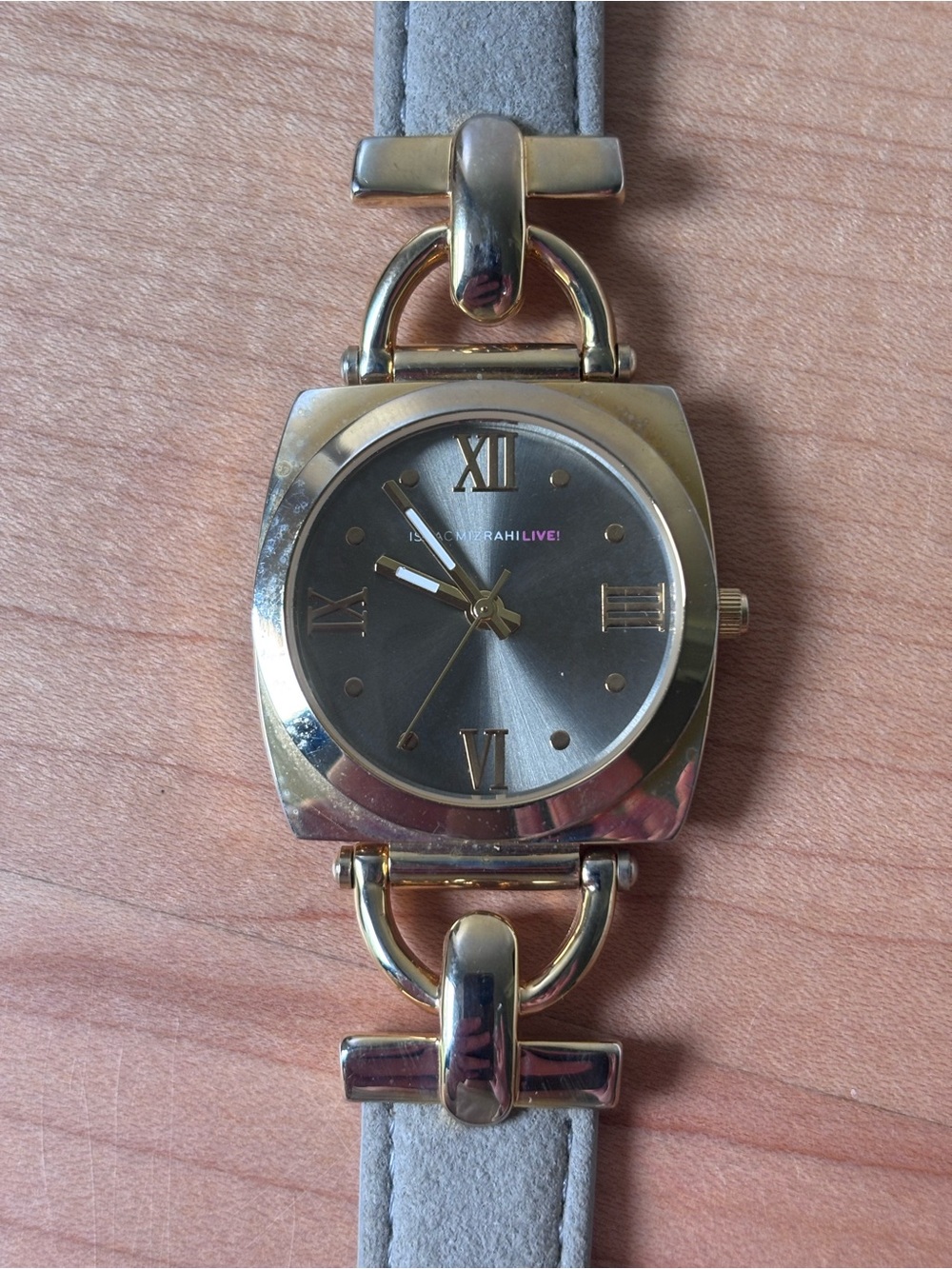 Isaac Mizrahi Live Gold-Tone Ladies Wristwatch with Gray Dial and Gray Strap